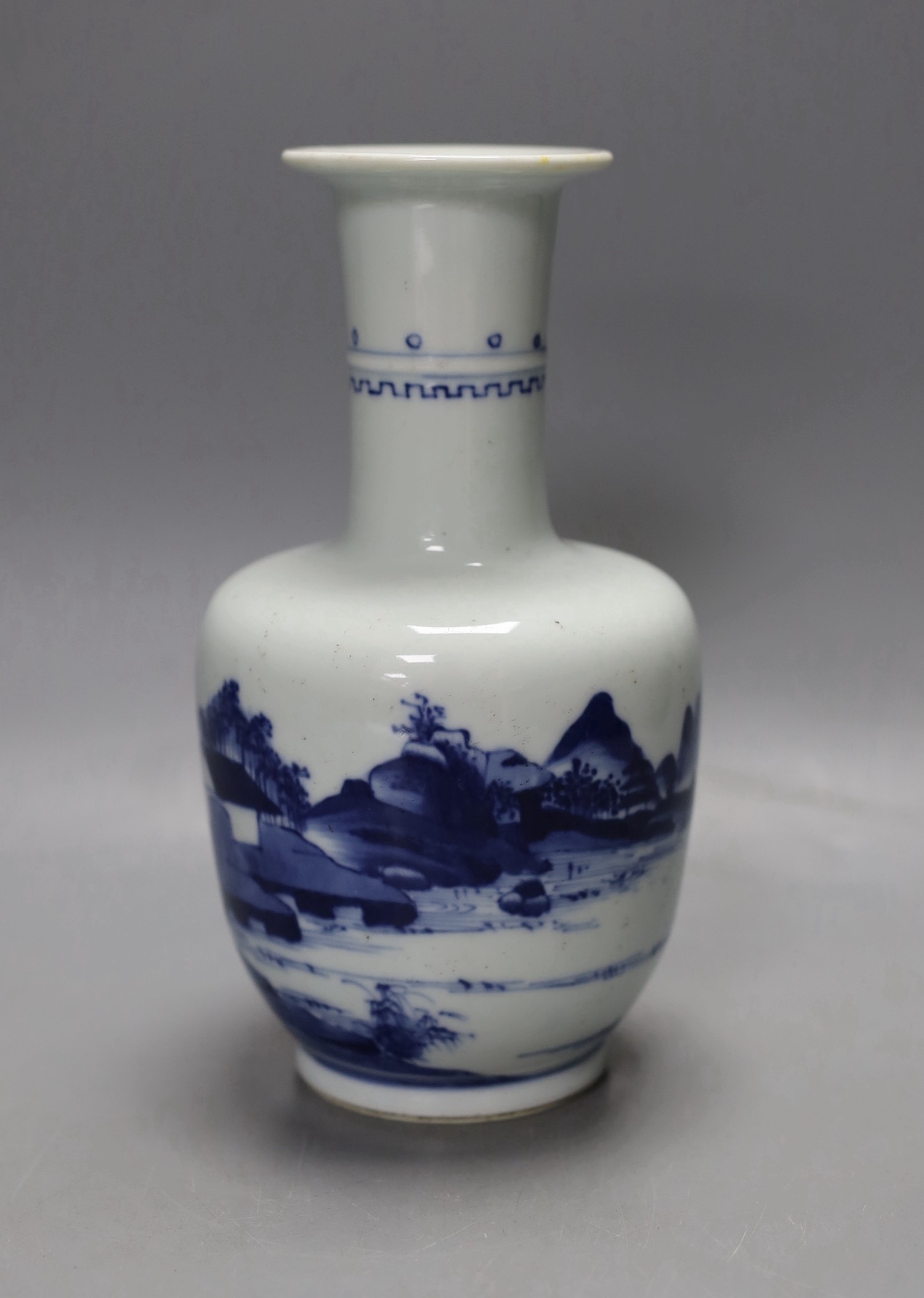 A Chinese blue and white ‘landscape’ vase, 20cm